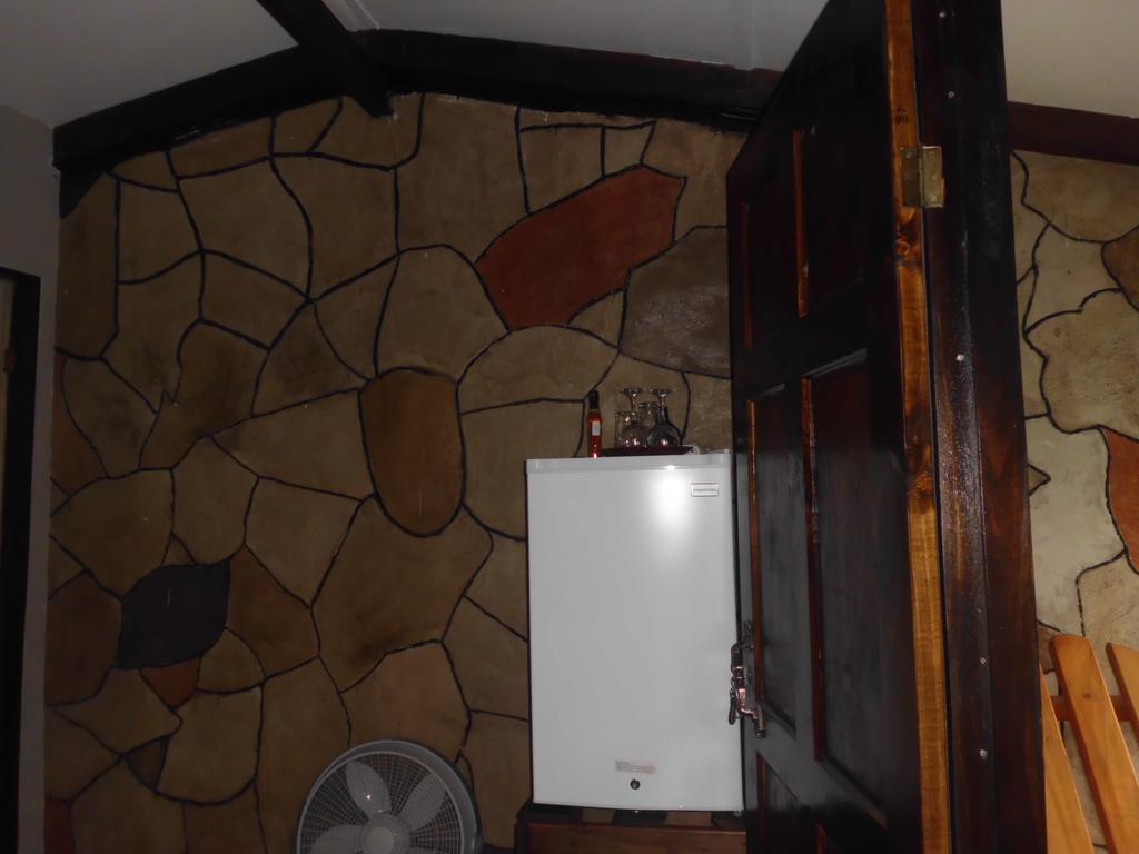 Nacientes Lodge Bijagua Rom bilde