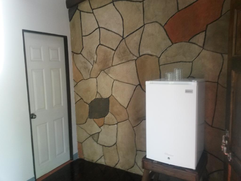 Nacientes Lodge Bijagua Rom bilde