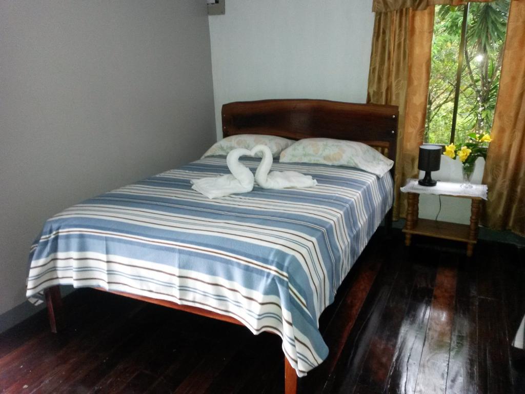 Nacientes Lodge Bijagua Rom bilde
