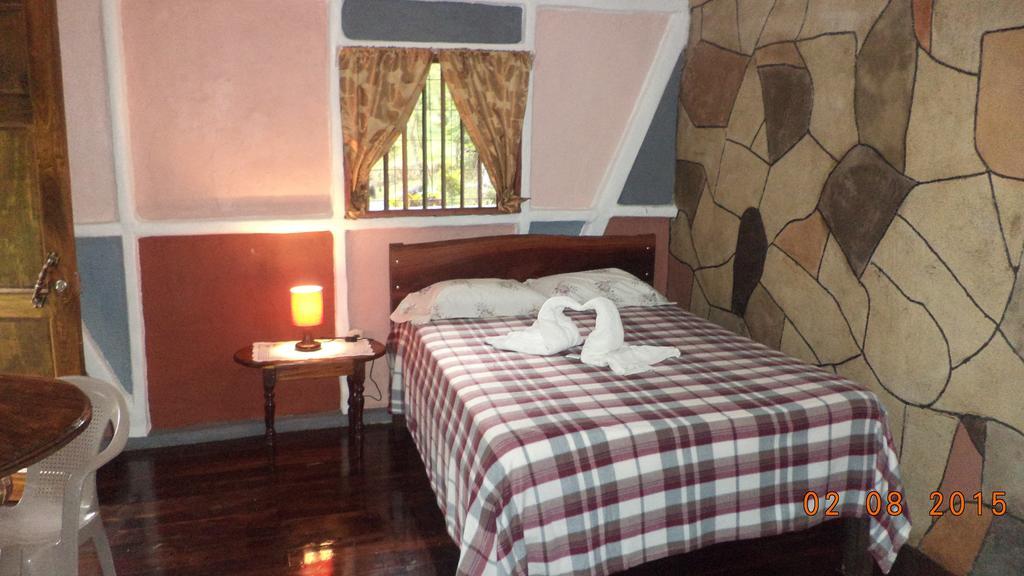 Nacientes Lodge Bijagua Rom bilde